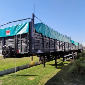 Sistema con argollas para tapar acoplados - TRANSPORTE
